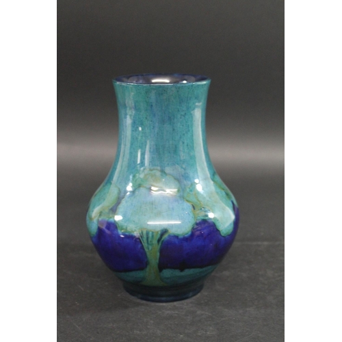 720 - MOORCROFT VASE - MOONLIT BLUE the vase of globe and shaft form in the Moonlit Blue design, painted w... 