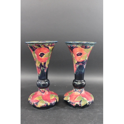 722 - PAIR OF WILLIAM MOORCROFT VASES - POMEGRANATE a large pair of vases with a trumpet shaped neck, in t... 