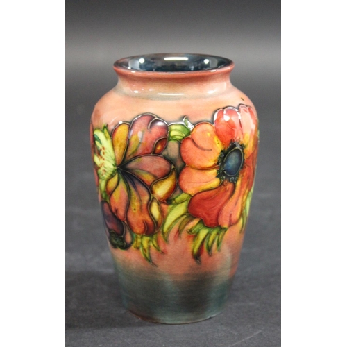 724 - MOORCROFT FLAMBE VASE a vase in the Anemone design and with a flambe glaze. Impressed marks, Moorcro... 