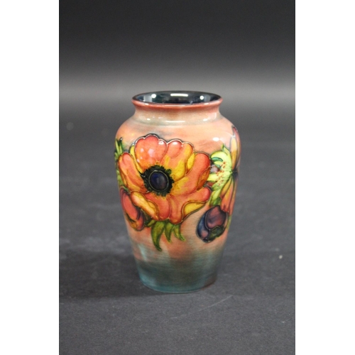 724 - MOORCROFT FLAMBE VASE a vase in the Anemone design and with a flambe glaze. Impressed marks, Moorcro... 