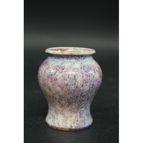 734 - RUSKIN MINIATURE HIGH FIRED VASE a squat miniature vase with a high fired glaze, small firing crack ... 