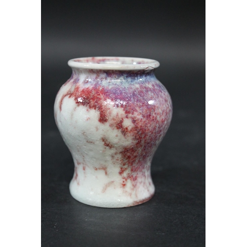 734 - RUSKIN MINIATURE HIGH FIRED VASE a squat miniature vase with a high fired glaze, small firing crack ... 