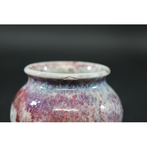 734 - RUSKIN MINIATURE HIGH FIRED VASE a squat miniature vase with a high fired glaze, small firing crack ... 