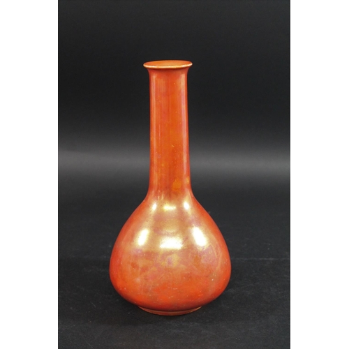 735 - RUSKIN VASE  the vase with a narrow tapering neck and bulbous body, and with a orange lustre glaze. ... 