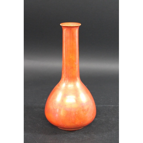 735 - RUSKIN VASE  the vase with a narrow tapering neck and bulbous body, and with a orange lustre glaze. ... 