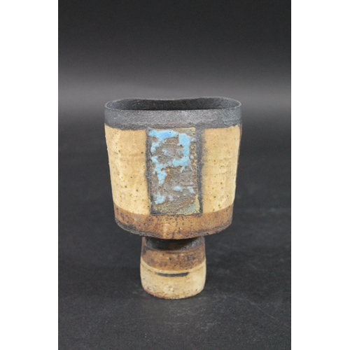 750 - ROBIN WELCH STUDIO POTTERY VASE a small stoneware vase of compressed form and circular base, with a ... 