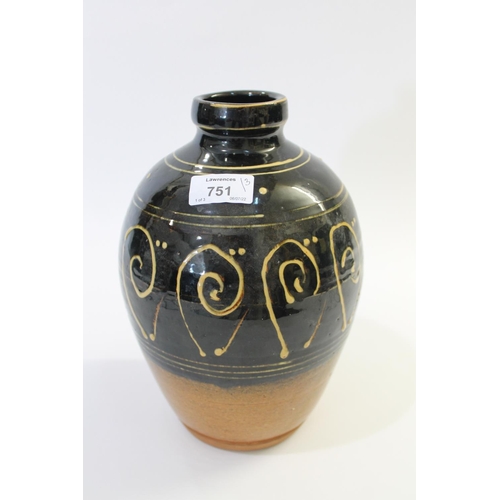 751 - ABUJA STUDIO POTTERY JUG with a tenmoku glaze and line decoration, seal mark to base of handle (diff... 