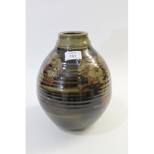 751 - ABUJA STUDIO POTTERY JUG with a tenmoku glaze and line decoration, seal mark to base of handle (diff... 