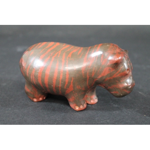 752 - SIDDIG EL NIGOUMI (1931-1996) POTTERY HIPPO - 1988 a small pottery model of a Hippo with a stripe ef... 