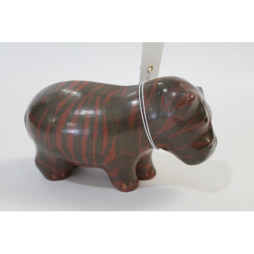 752 - SIDDIG EL NIGOUMI (1931-1996) POTTERY HIPPO - 1988 a small pottery model of a Hippo with a stripe ef... 