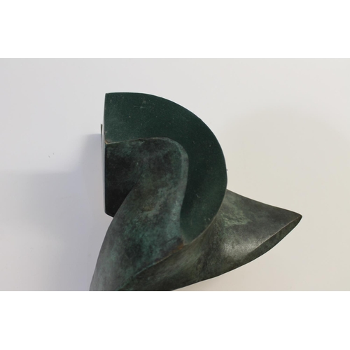 760 - ABSTRACT BRONZE SCULPTURE a polished bronze abstract sculpture of curving shape, with a verdigris lo... 