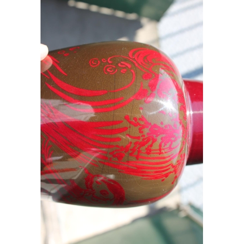 766 - BERNARD MOORE LIDDED LUSTRE VASE a large red lustre vase of tapering form designed with stylised fis... 