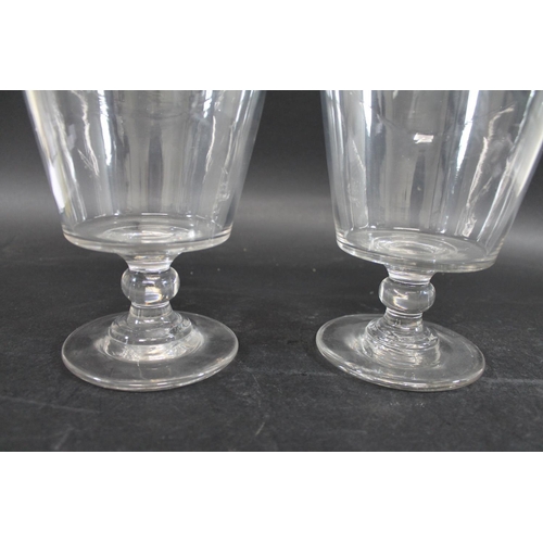 824 - PAIR OF LARGE GLASS GOBLETS an unusually large pair of hand blown goblets, with a tapering body, kno... 