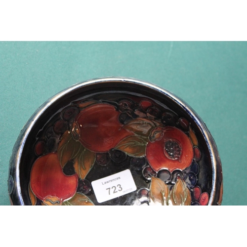 723 - WILLIAM MOORCROFT BOWL in the Pomegranate design on a blue ground. Painted signature and impressed m... 