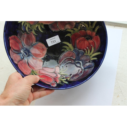 731 - LARGE MOORCROFT BOWL - 1983 a large bowl in the Anemone design on a blue ground, marked to the rever... 