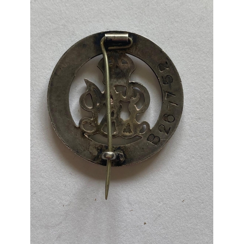 184 - A SILVER WAR BADGE TO THE ROYAL SUSSEX REGIMENT. A Great War silver war badge number B267752 awarded... 