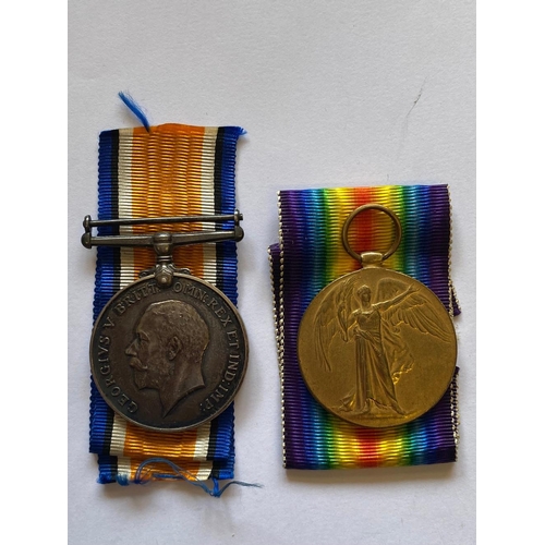 286 - A FIRST WORLD WAR PAIR AND MEMORIAL PLAQUE TO THE EAST LANCASHIRE REGIMENT. A Great War Pair compris... 