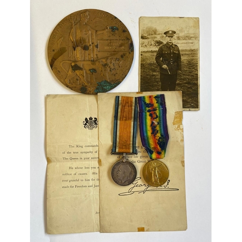 299 - A FIRST WORLD WAR PAIR AND MEMORIAL PLAQUE TO THE MANCHESTER REGIMENT. A Great War pair comprising W... 