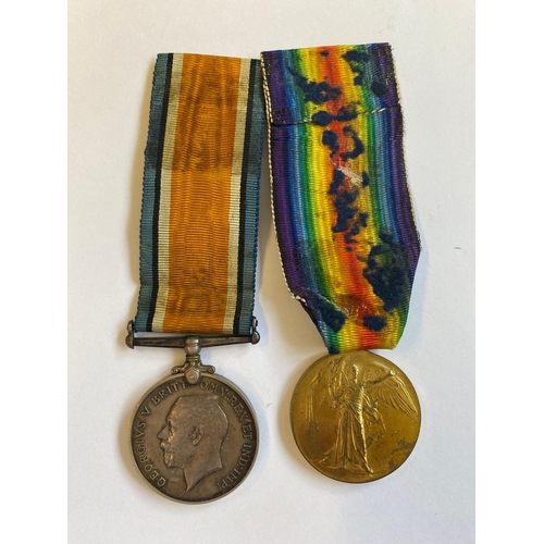 299 - A FIRST WORLD WAR PAIR AND MEMORIAL PLAQUE TO THE MANCHESTER REGIMENT. A Great War pair comprising W... 