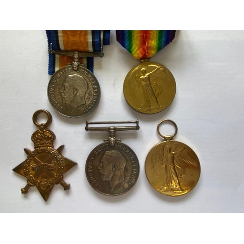 320 - FIRST WORLD WAR MEDALS AND MEMORIAL PLAQUE TO BROTHERS. A Great War Trio comprising 1914-15 Star nam... 