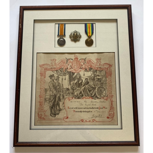 42 - A FIRST WORLD WAR PAIR, BADGE AND SCROLL TO THE ROYAL SCOTS. A Great War pair comprising War medal a... 