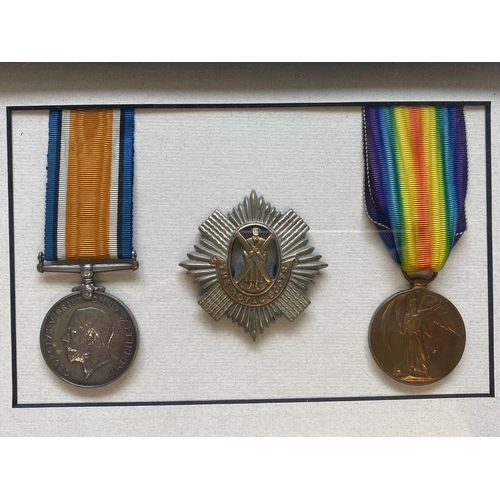 42 - A FIRST WORLD WAR PAIR, BADGE AND SCROLL TO THE ROYAL SCOTS. A Great War pair comprising War medal a... 