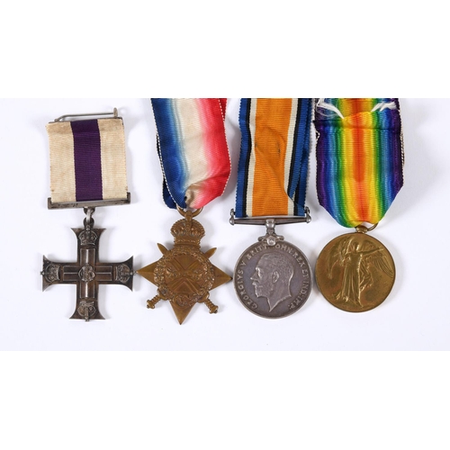 590 - A MILITARY CROSS GROUP OF FOUR TO A CASUALTY WITH THE ARTILLERY. A Great War Group of four comprisin... 