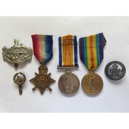 86 - A FIRST WORLD WAR TRIO AND SILVER WAR BADGE TO THE GLOUCESTER REGIMENT. A Great War Trio comprising ... 