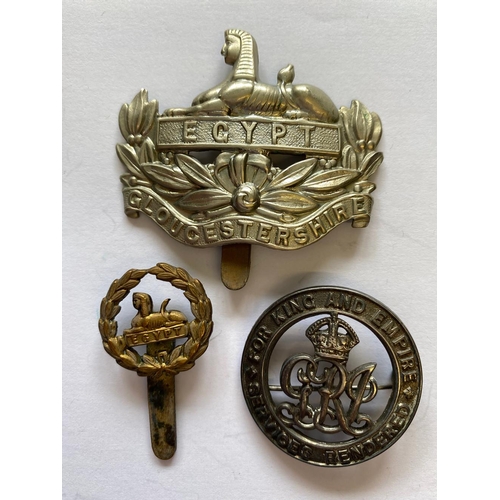 86 - A FIRST WORLD WAR TRIO AND SILVER WAR BADGE TO THE GLOUCESTER REGIMENT. A Great War Trio comprising ... 