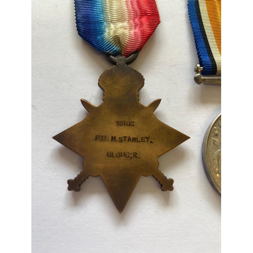 86 - A FIRST WORLD WAR TRIO AND SILVER WAR BADGE TO THE GLOUCESTER REGIMENT. A Great War Trio comprising ... 