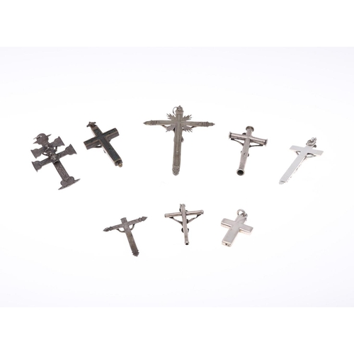 919 - A QUANTITY OF EARLY PECTORAL CRUCIFORM PENDANTS. all depicting Christ on the Cross, metal.  **BP 22.... 