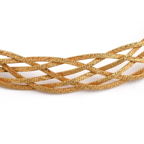 938 - AN 18CT GOLD NECKLACE. of openwork textured form, with concealed clasp, 45cm long, 35 grams.  **BP 2... 