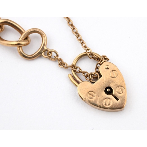 946 - A 9CT GOLD OVAL LINK BRACELET. with padlock claps, each link stamped 375, 19.5cm long, 17.3 grams.  ... 