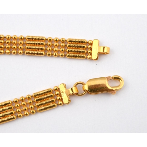 952 - A 22CT GOLD FANCY LINK NECKLACE. 40cm long, 19.5 grams.  **BP 22.5% inc VAT + Lot Fee of £8