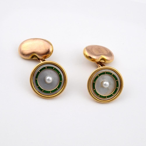 976 - A PAIR OF MOTHER OF PEARL AND ENAMEL CUFFLINKS. each mother of pearl link centred with a small pearl... 