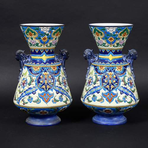 760 - LARGE PAIR OF SARREGUEMINES FRENCH POTTERY VASES - PERSIAN STYLE. A large pair of vases each painted... 