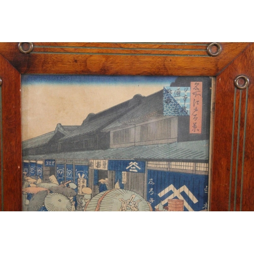 897 - JAPANESE FRAMED WOODBLOCK PRINT. Meiji period, the woodblock print with a depiction of figures walki... 