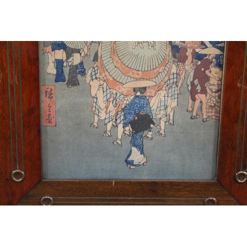 897 - JAPANESE FRAMED WOODBLOCK PRINT. Meiji period, the woodblock print with a depiction of figures walki... 