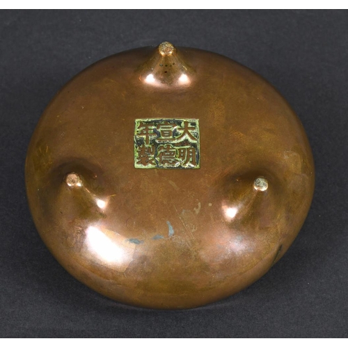 900 - CHINESE BRONZE CENSOR. Probably 18th century, the bronze censor with raised loop handles and support... 