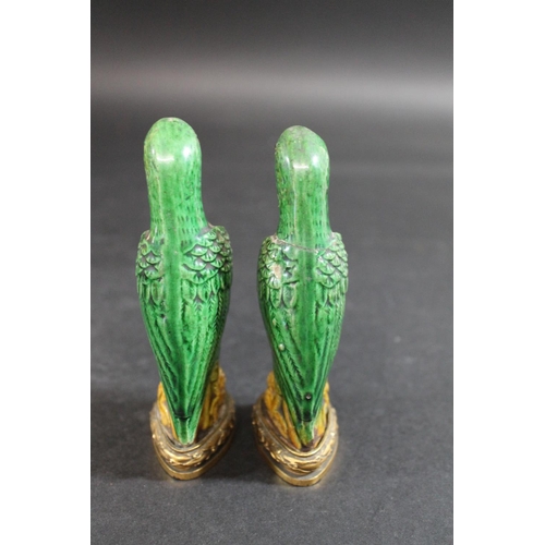 904 - PAIR OF 18THC CHINESE PORCELAIN PARROTS & ORMOLU MOUNTS. A pair of small green glazed Parrots, each ... 