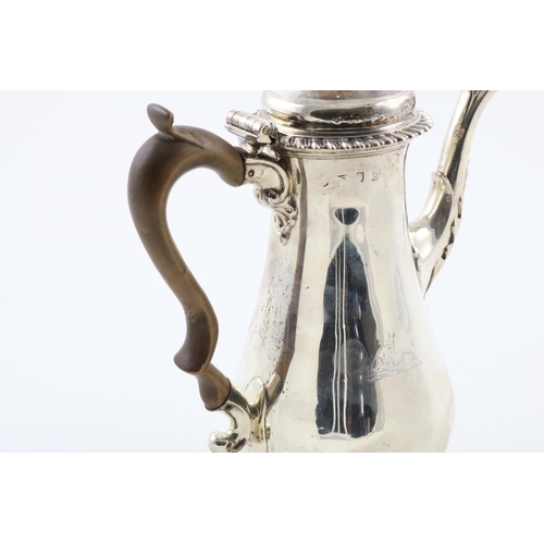 136 - A GEORGE III COFFEE POT. of baluster form, with a domed cover, domed foot, gadrooned borders and a l... 