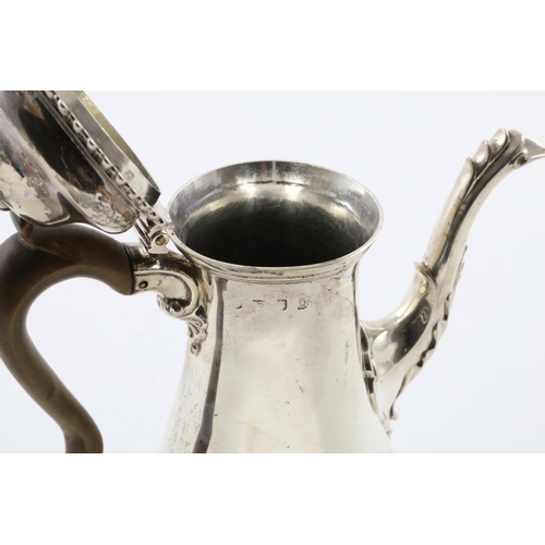 136 - A GEORGE III COFFEE POT. of baluster form, with a domed cover, domed foot, gadrooned borders and a l... 