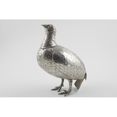 137 - A LATE 19TH/EARLY 20TH CENTURY FIGURE OF A GROUSE. with a detachable head (partly marked) and two hi... 