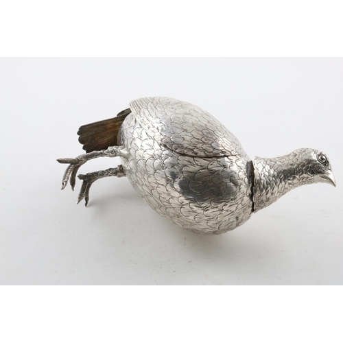 137 - A LATE 19TH/EARLY 20TH CENTURY FIGURE OF A GROUSE. with a detachable head (partly marked) and two hi... 