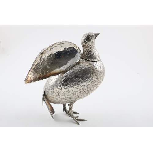 137 - A LATE 19TH/EARLY 20TH CENTURY FIGURE OF A GROUSE. with a detachable head (partly marked) and two hi... 