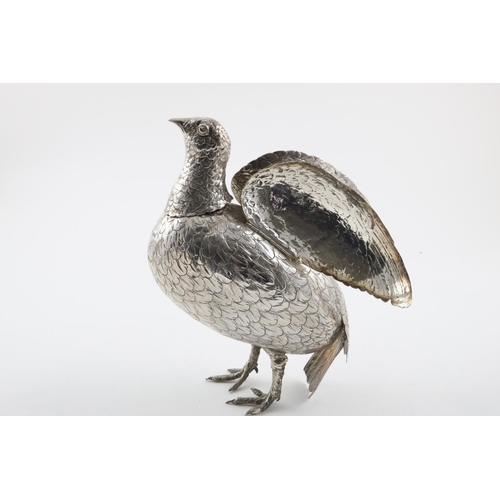 137 - A LATE 19TH/EARLY 20TH CENTURY FIGURE OF A GROUSE. with a detachable head (partly marked) and two hi... 