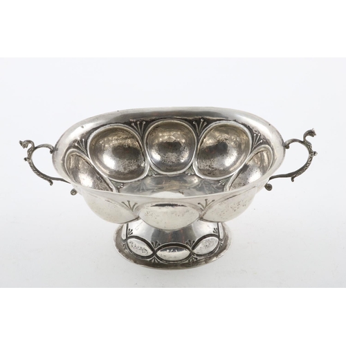 138 - A LATE 19TH/EARLY 20TH CENTURY DUTCH BRANDY BOWL. of lobed oval form, on a domed foot, with two scro... 