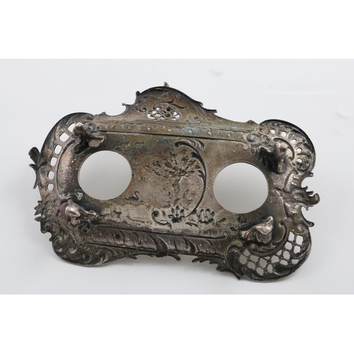 141 - A LATE 19TH CENTURY INKSTAND. of shaped rectangular form, with a pierced floral and scroll border an... 