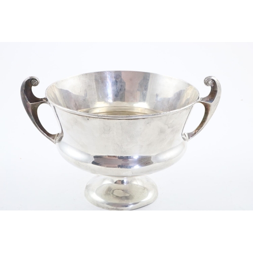 156 - AN EDWARDIAN ART NOUVEAU TWO-HANDLED BOWL. with two flying scroll handles and a slightly flaring cir... 