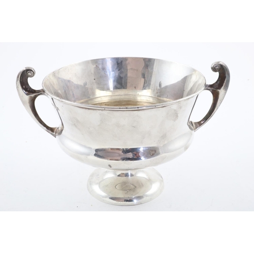 156 - AN EDWARDIAN ART NOUVEAU TWO-HANDLED BOWL. with two flying scroll handles and a slightly flaring cir... 